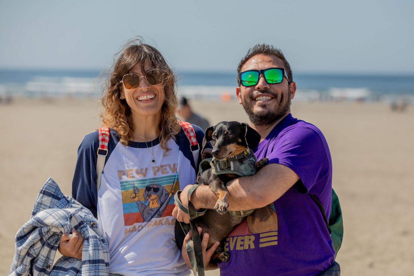 Phil Benavides and Dr. Liz Cahill with their dachshund